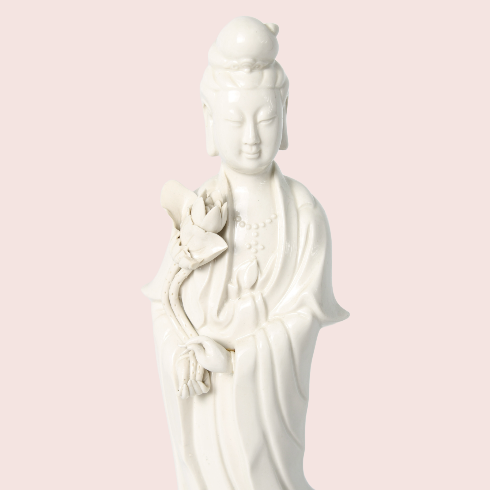 Vintage blanc-de-Chine Guanyin statue from China – white porcelain with lotus