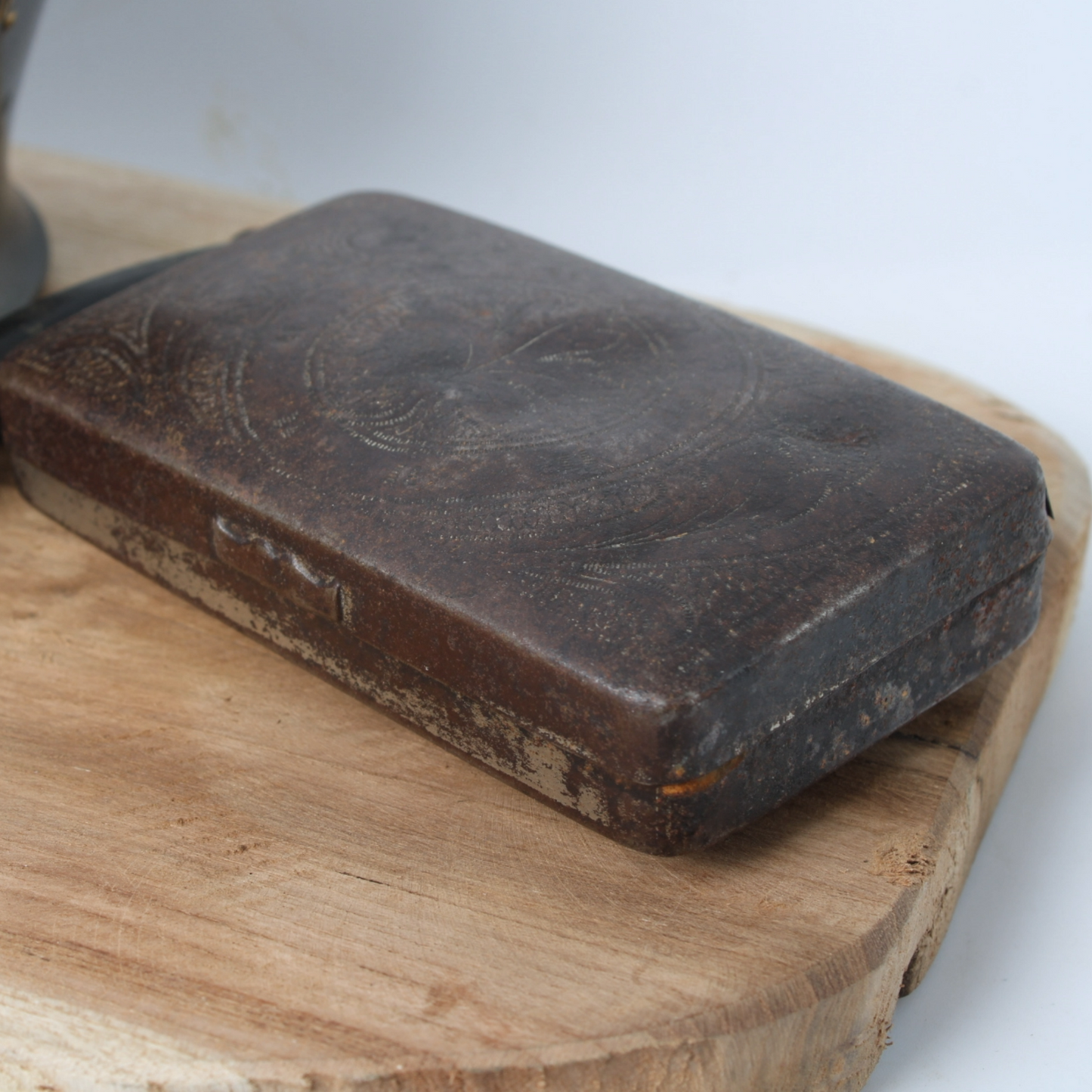 Vintage metal tobacco jar with wooden pipes, tin box and rustic wooden tray
