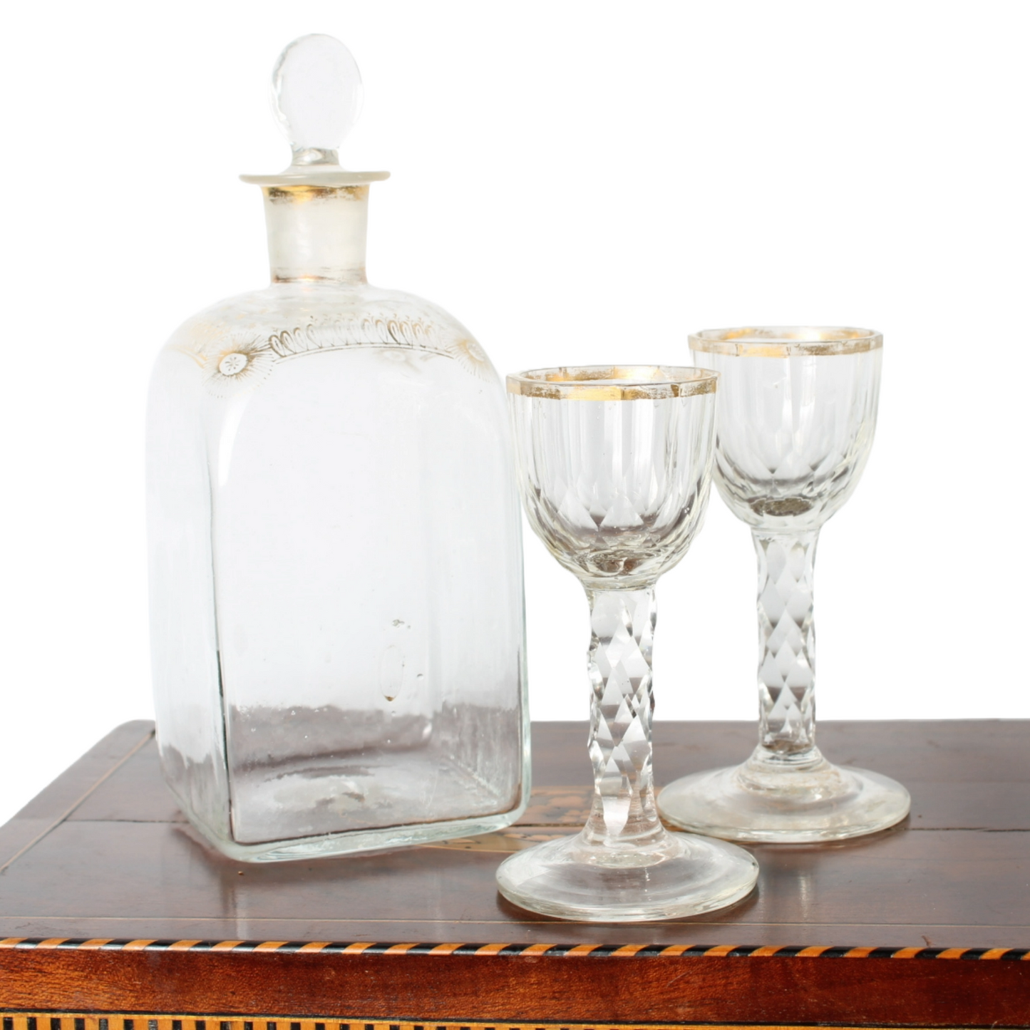 Antique mahogany tantalus with six cut-glass decanters and glasses, ca. 1790