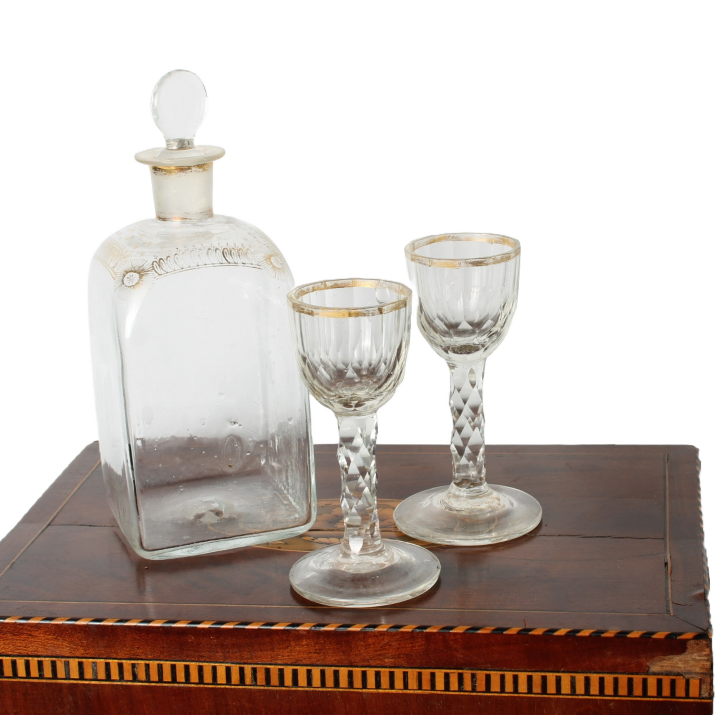 Antique mahogany tantalus with six cut-glass decanters and glasses, ca. 1790