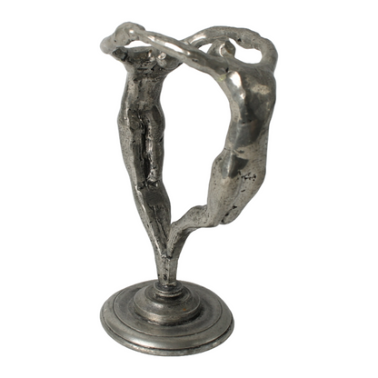 Abstract Pewter Sculpture – Stylized Two-Figure Artwork, Circular Design