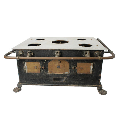 Zeldzaam antiek speelgoedfornuis met klauwpoten en pannenset ca. 19001925 | 22 cm hoog | 8.66 inch | Poppenhuisfornuis met gasleidingen