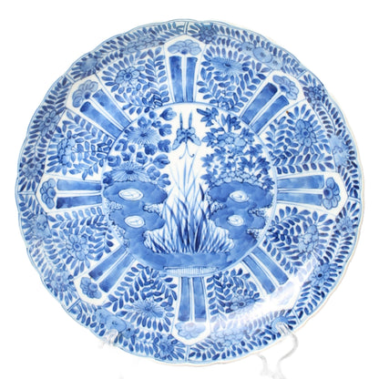 Beautiful 19th-Century Chinese Blue-and-White Porcelain Plate in Kangxi Style with Floral Panels and Garden Scene Ø 25 cm